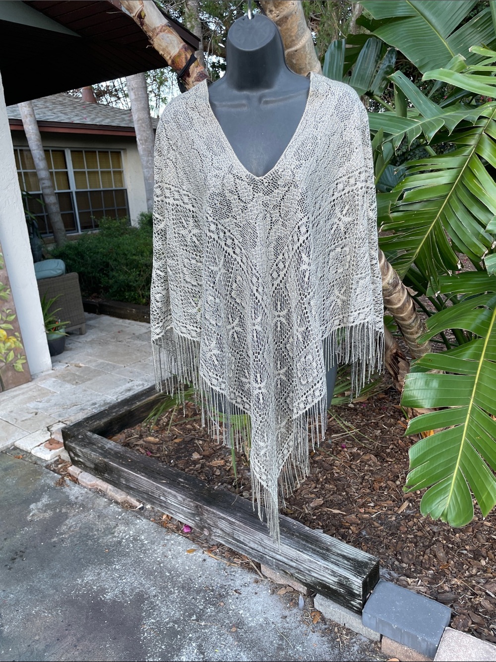 silver, and gold, crochet fringe scarf, or calf poncho